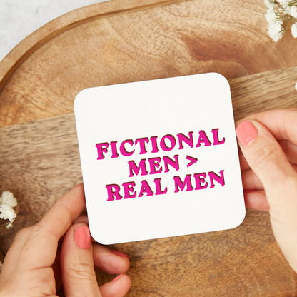 Funny book lover coaster featuring a fictional men themed design, perfect for readers who are obsessed with romance books. Glossy square coaster ideal as a gift for bookworms, smut readers, book club friends, birthdays, or Secret Santa.