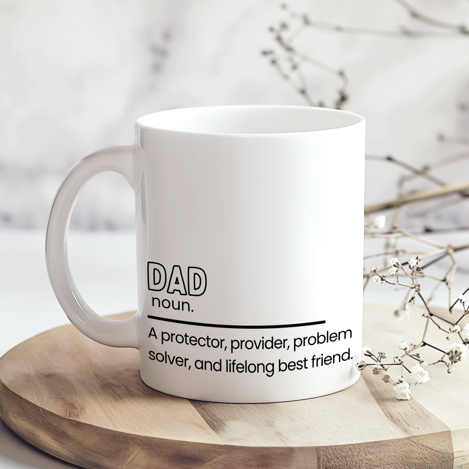 White ceramic mug with heartfelt dad definition quote reading “A protector, provider, problem solver, and lifelong best friend,” displayed on wooden board in neutral styled mockup, sentimental Father’s Day gift for dads.