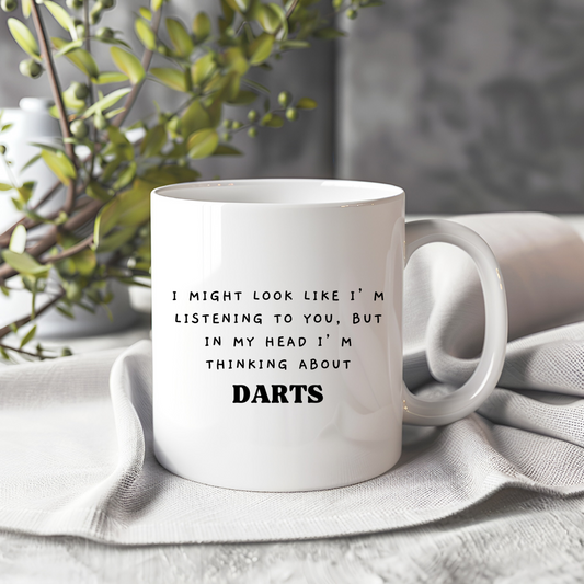 White ceramic mug with funny darts-themed design. Perfect darts gift for players, darts lovers, and friends. Ideal novelty coffee mug