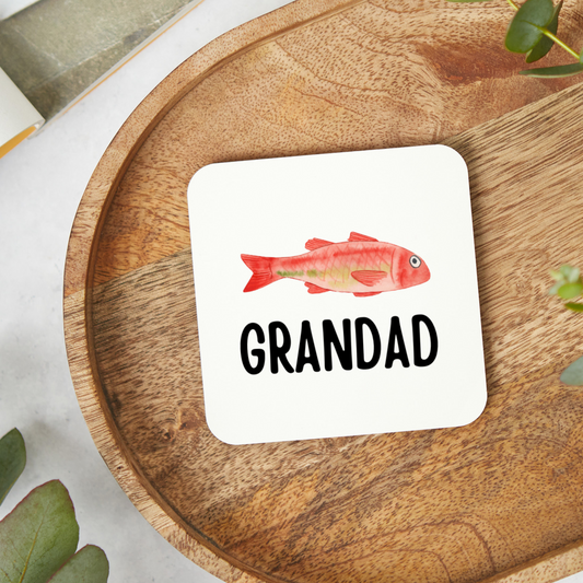 Round personalised fishing coaster with playful fish doodles and the phrase ‘Best served by the water’s edge’. A thoughtful Father’s Day gift for fishing lovers