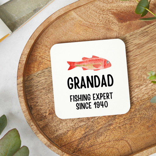 Round personalised fishing coaster with playful fish doodles and the phrase ‘Best served by the water’s edge’. A thoughtful Father’s Day gift for fishing lovers