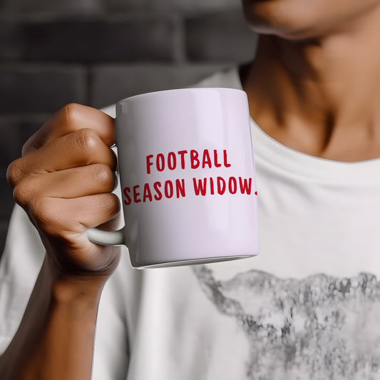 White glossy ceramic mug with funny “Football Season Widow” text printed on both sides, cheeky Valentine’s Day gift for football-loving couples.