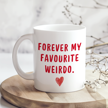 White glossy ceramic mug with “Forever My Favourite Weirdo” text printed on both sides, cute and funny romantic gift mug.