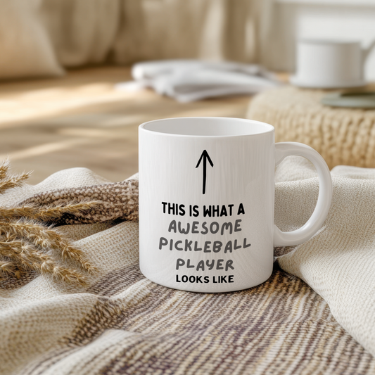 Glossy ceramic mug with a funny pickleball-themed design, perfect for pickleball players and fans.