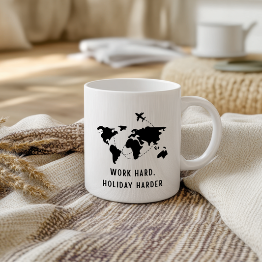 White glossy ceramic mug with travel-themed design printed on both sides, perfect for holiday lovers and adventure seekers