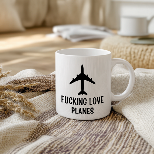Glossy ceramic mug with a funny airplane design, perfect gift for plane lovers and aviation enthusiasts.