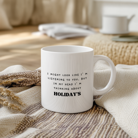 White glossy ceramic mug with travel-themed design printed on both sides, perfect for holiday lovers and adventure seekers
