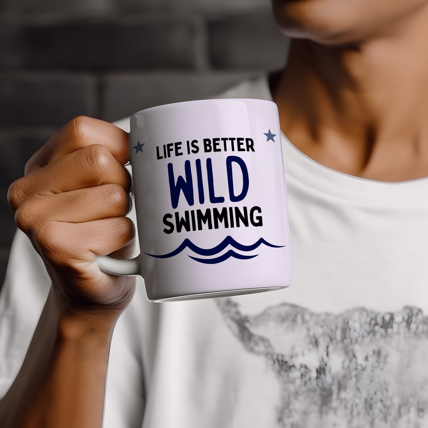 White glossy ceramic mug with the phrase “Wild Swimmer” in a fun, bold design — perfect gift for open water swimmers and swimming enthusiasts