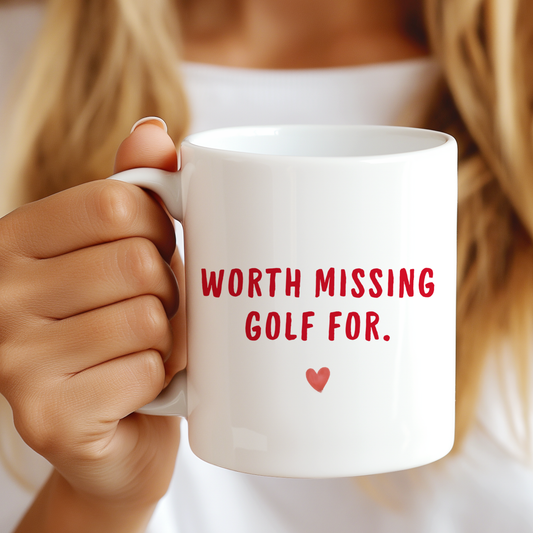 White glossy ceramic mug with funny Valentine’s Day golf-themed text printed on both sides, cute gift for golf-loving couples.