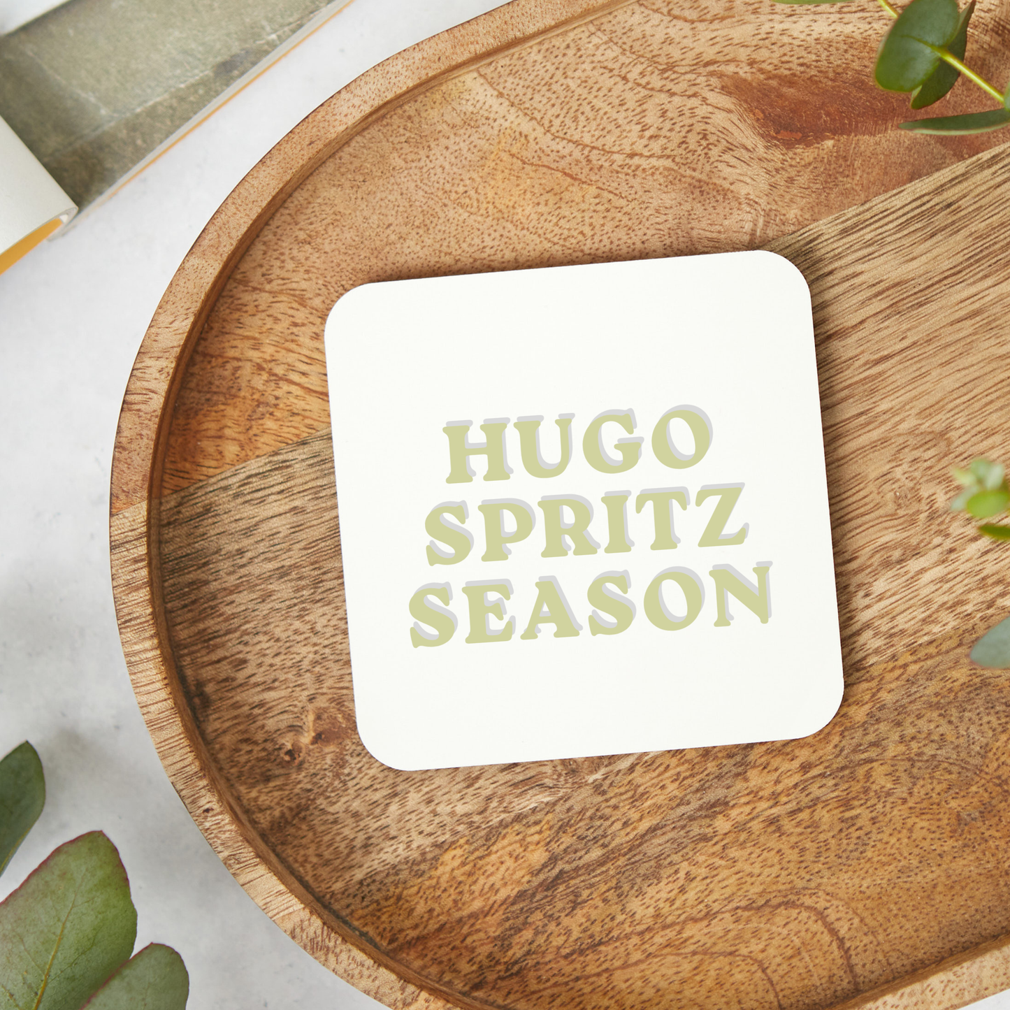 Stylish Hugo Spritz coaster featuring a fun cocktail-inspired design, perfect for Hugo Spritz lovers and aperitif fans. Glossy hardboard coaster ideal as a stocking filler, cocktail gift, birthday present or cute home bar accessory.