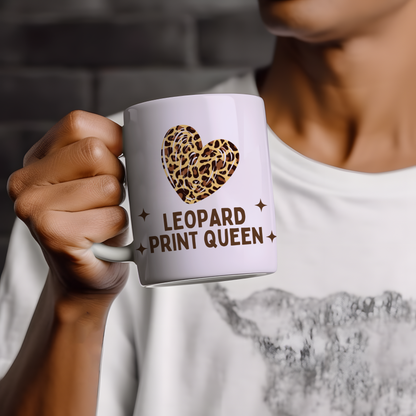 Glossy white Leopard Print Queen mug with a leopard-patterned heart and retro brown lettering.