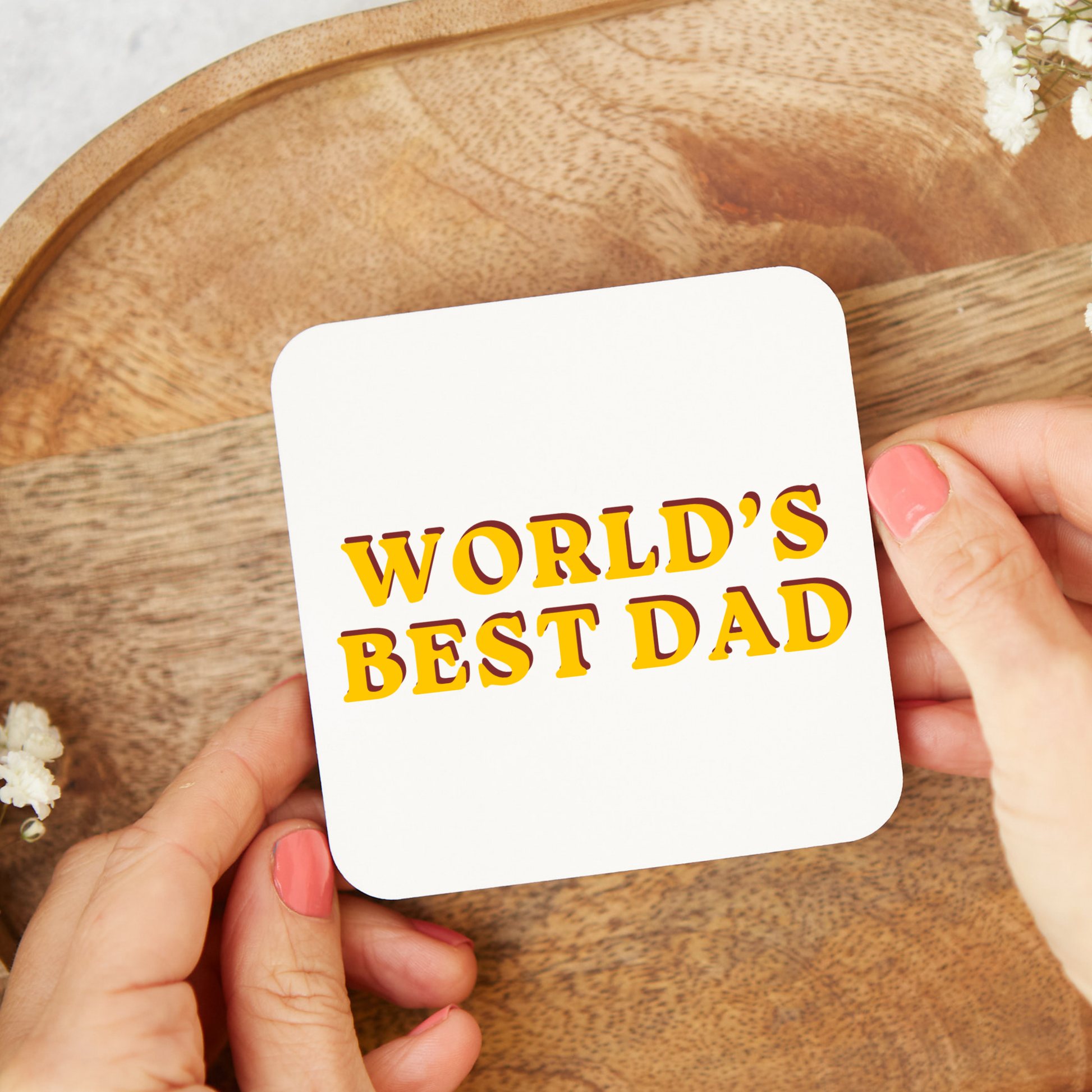 Retro “World’s Best Dad” glossy coaster with bold vintage-style typography, square 9x9cm hardboard coaster, funny Father’s Day gift for dads, easy wipe clean finish, retro coffee coaster for home or office desk